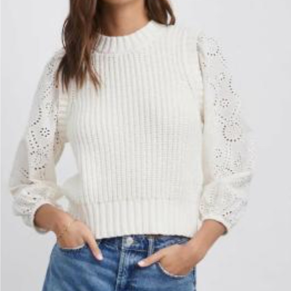 Rails Sweater vest with eyelet sleeves.